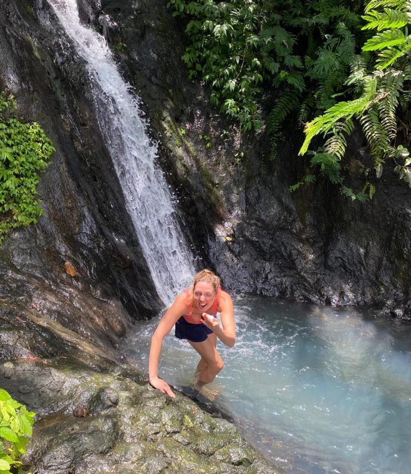 Climbing waterfall in bali